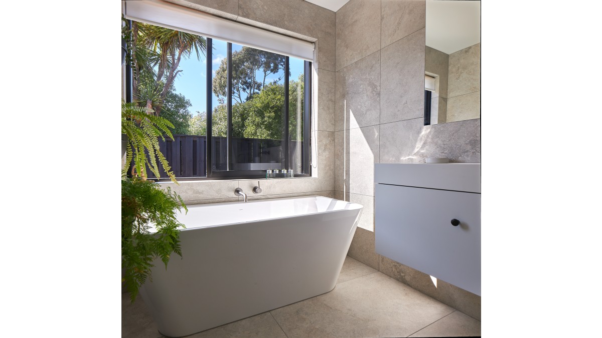 Residential Series Sliding Windows open up the bathroom space.