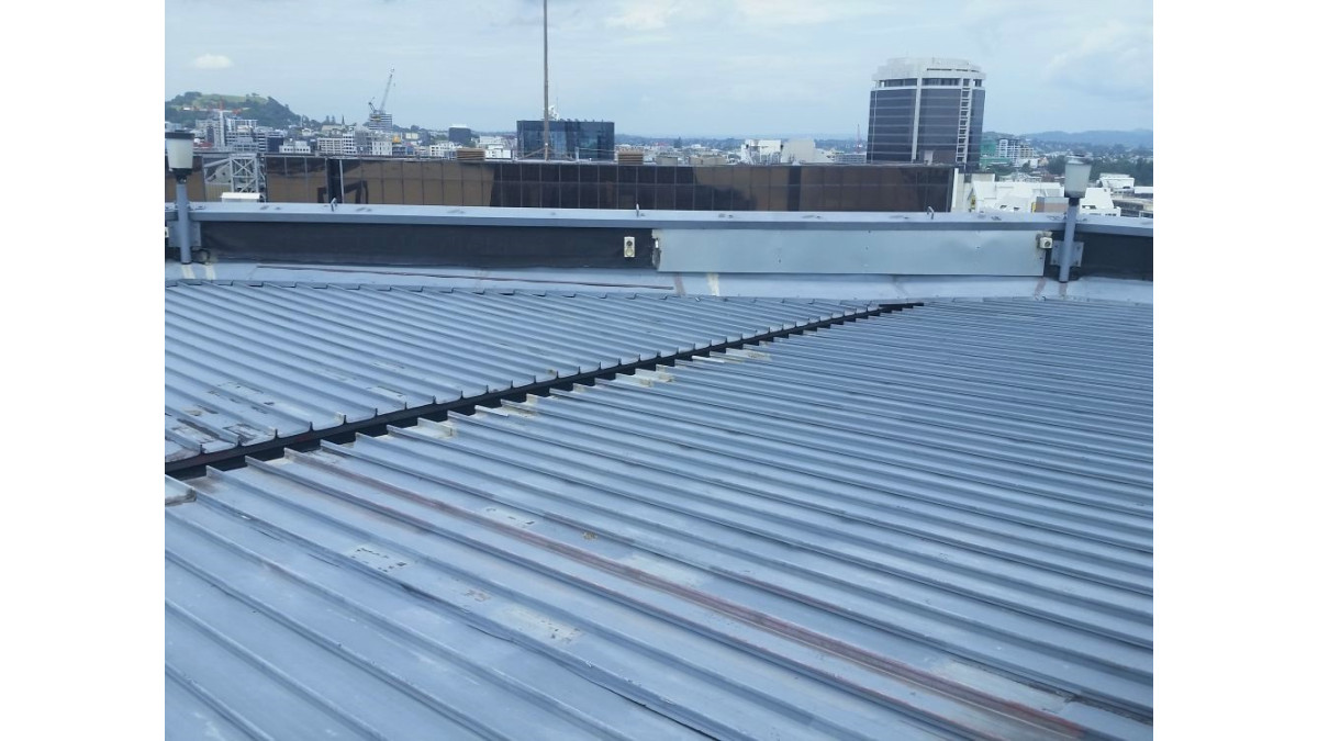The existing metal tray roof. 