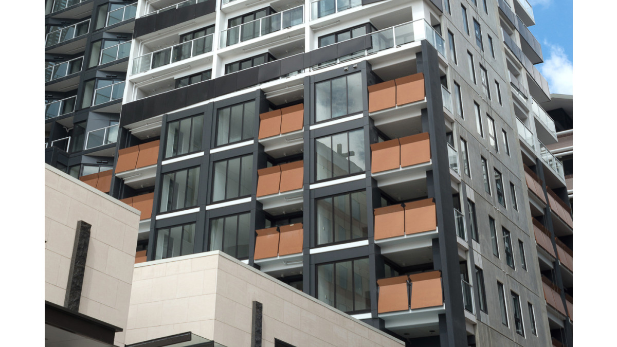 Queens Residences   Skyrail A (Solid) Series   Orange profiled solid panel with bespoke framework fixing