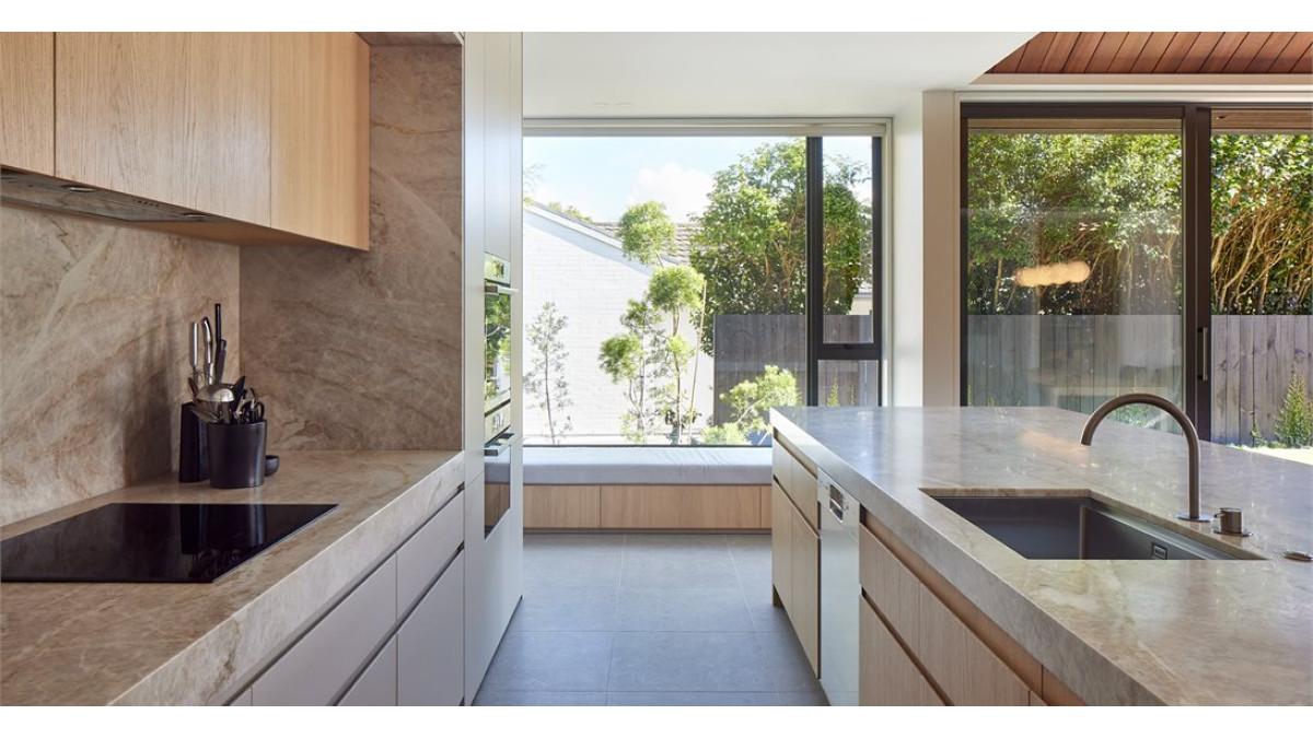 natural light streams into the kitchen