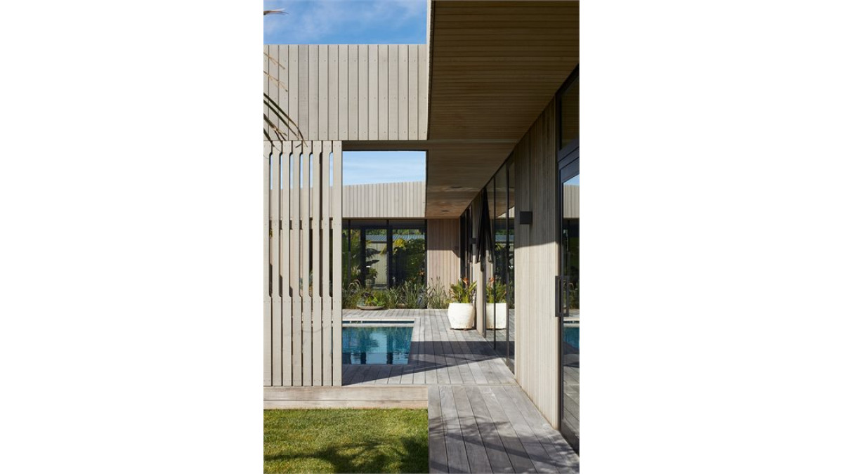 sliding doors and wooden screens can open up or shut off spaces