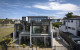 the bedroom is placed on the top floor for maximum views