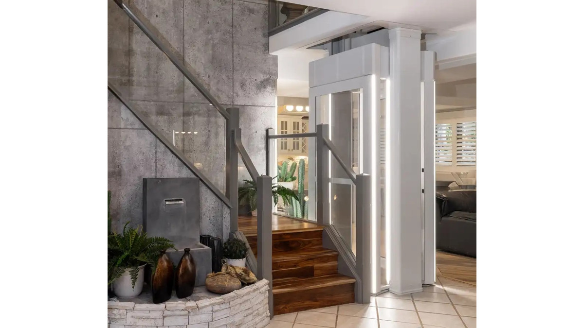 Savaria Luma Through floor lift on bottom landing of beautiful home