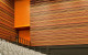 arena wall claudelands horizontal terracotta battens