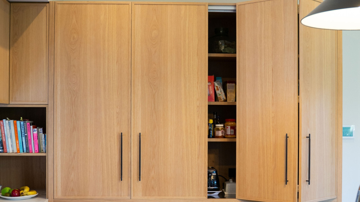 Cinetto Bifolds for Over Bench Pantry and Appliance Storage Project by Seaform Kitchens and Interiors.