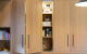 Cinetto Bifolds for Over Bench Pantry and Appliance Storage. Project by Seaform Kitchens and Interiors