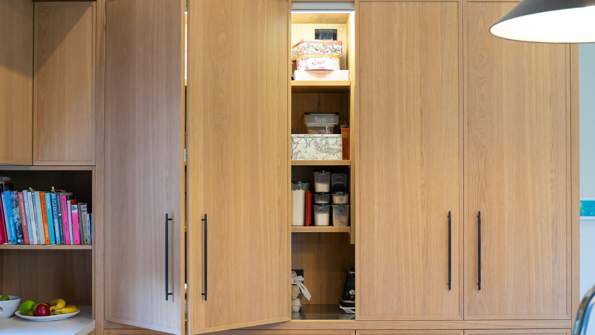 Cinetto Bifolds for Over Bench Pantry and Appliance Storage. Project by Seaform Kitchens and Interiors