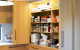 Cinetto Bifolds for Over Bench Pantry and Appliance Storage. Project by Seaform Kitchens and Interiors.