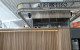 SE H4 at Airspresso Cafe New Plymouth Airport. by Gibbons Architects, Clelands Construction and New Plymouth Joinery