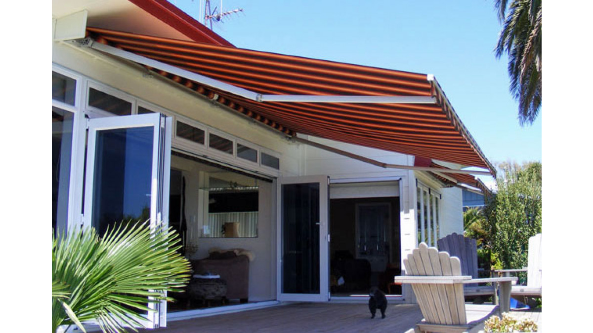Deauville Awning offers additional afternoon shade for this large deck and outdoor area