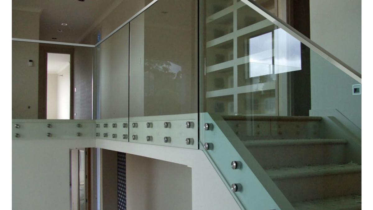 3 Double Disc Frameless Glass Internal Balustrade with interlinking top rail to comply with new regulations