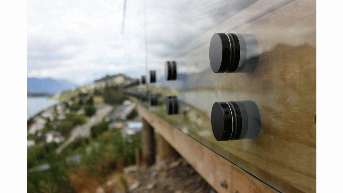 Edgetec Double Disc Anchor Frameless Glass Balustrade in Satin Black Powder Coat Finish to match the homes joinery