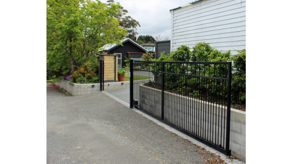 Classic Series Gate System on a modern home with automated opening and closing