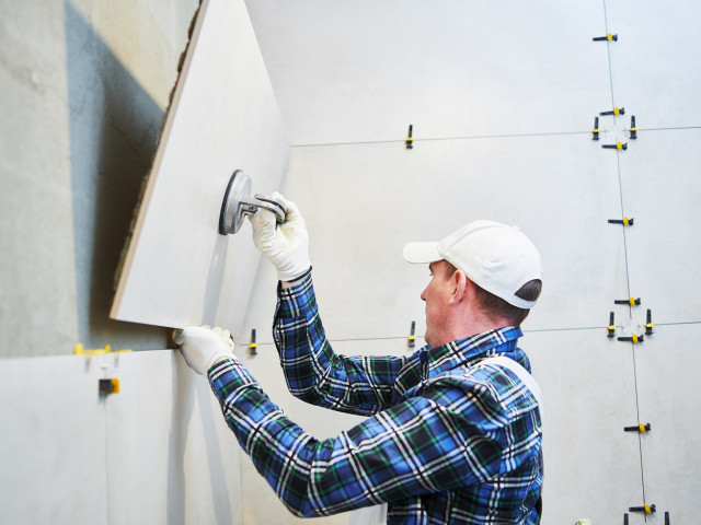 Installation of Large Format Porcelain Tiles for Interior Floors and Walls 