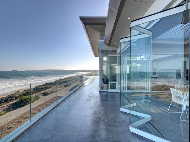 GlassEntry® Bi-Fold Frameless Glass Sliding Door System
