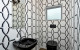 The wow factor in full force in a guest bathroom with Room 20 Wallpaper 8800 62 from Resene.