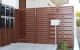 6 1.8m Custom Fresno fence with pedestrian gate installed at Zavos Corner Apartments Wellington