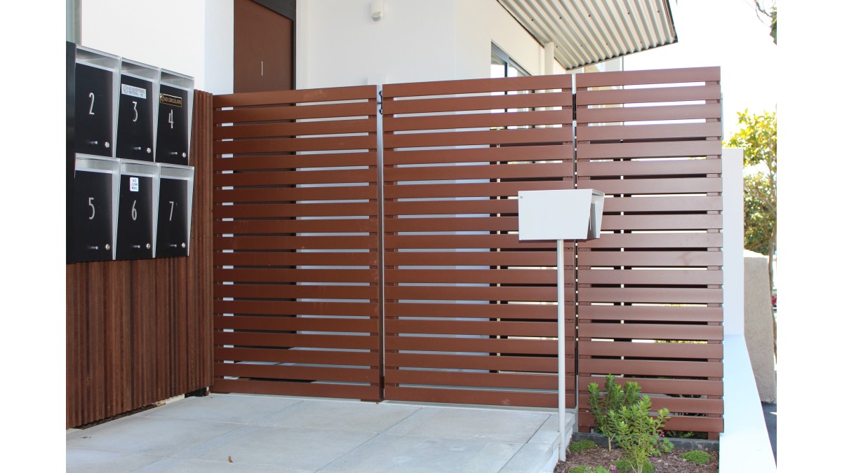 6 1.8m Custom Fresno fence with pedestrian gate installed at Zavos Corner Apartments Wellington