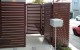 7 1.8m Custom Fresno fence with pedestrian gate installed at Zavos Corner Apartments Wellington