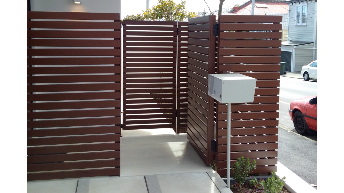7 1.8m Custom Fresno fence with pedestrian gate installed at Zavos Corner Apartments Wellington