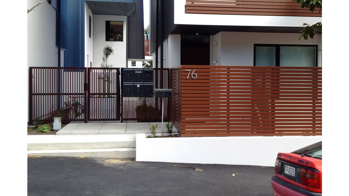 8 1.8m Custom Fresno fence and enterance gate installed at Zavos Corner Apartments Wellington