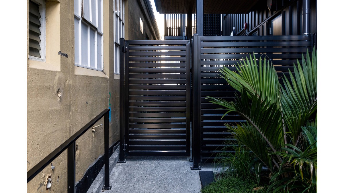 9a 1.8m Fresno fence screening refuse area at Marlborough Apartments Auckland