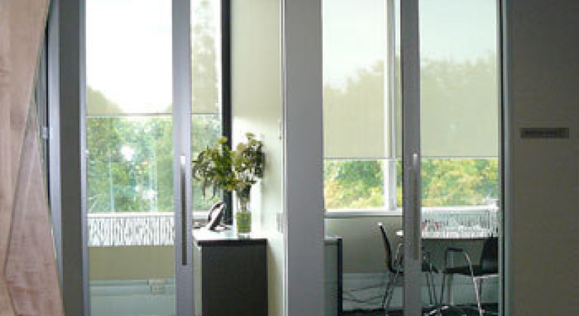 Full-Height Sliding Door Solution for Deloitte Hamilton