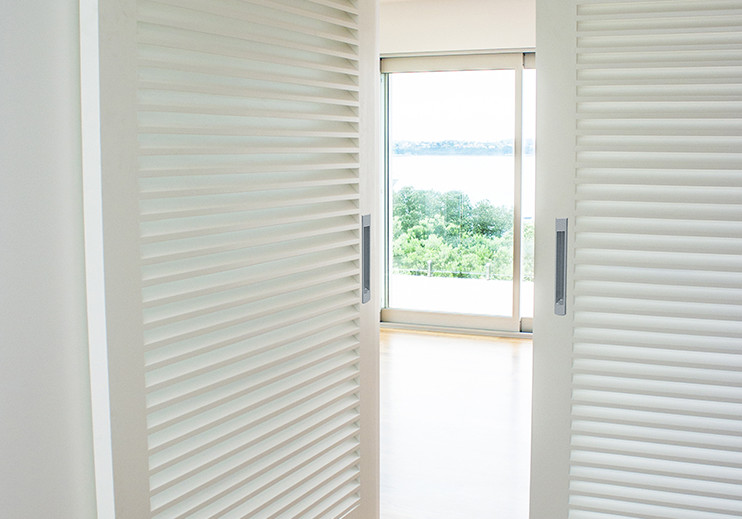 ASSA ABLOY Introduces The Henderson Soltaire Low Headroom Door System