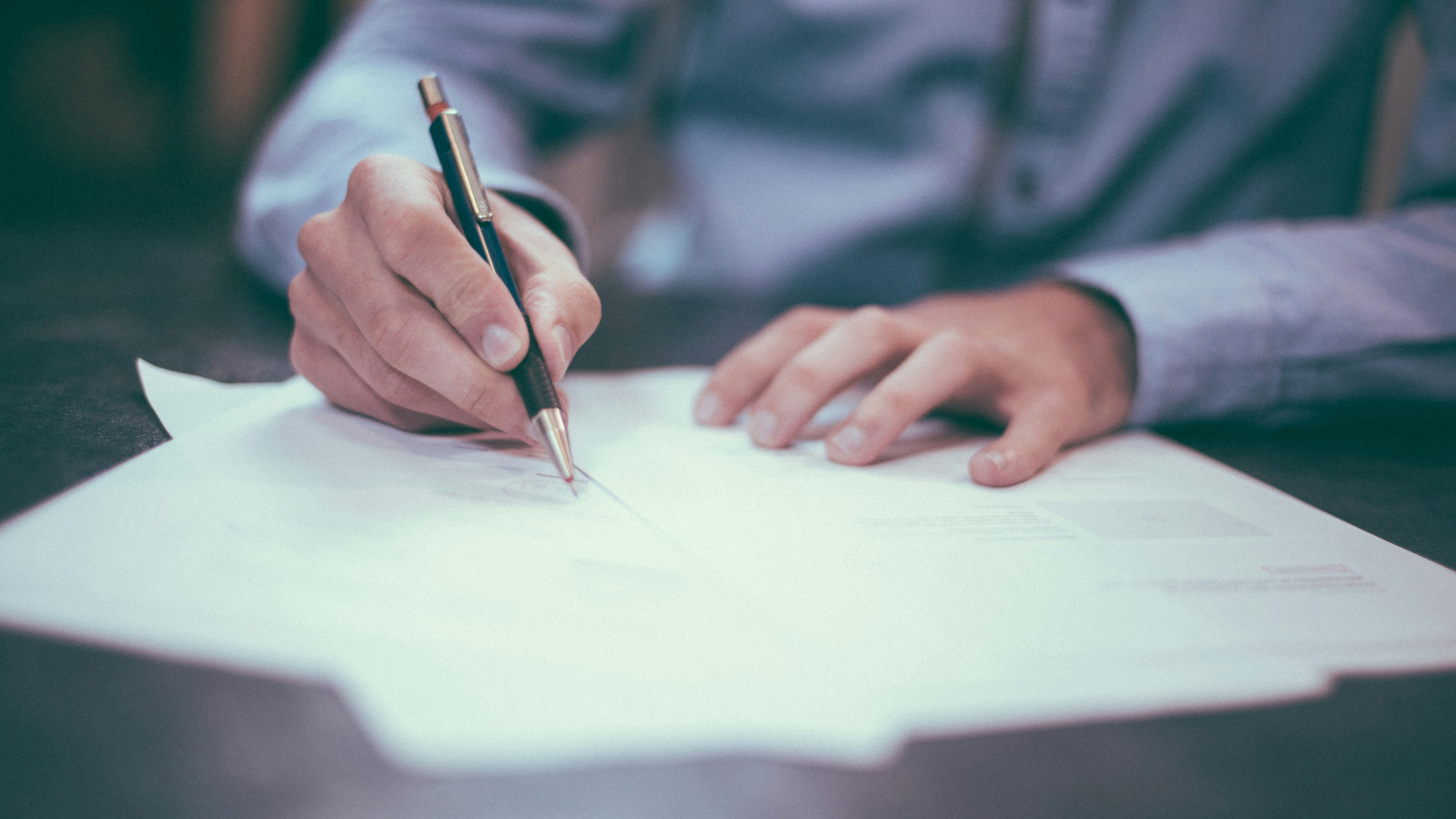 signing a contract photo sourced via unsplash by scott graham