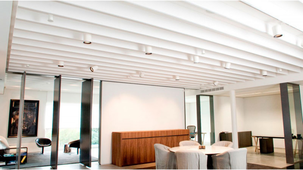 Asona has developed a solution to create linear acoustic baffle panels that are direct fixed to a level 5 plasterboard ceiling using concealed fixings at the rear of the panels.