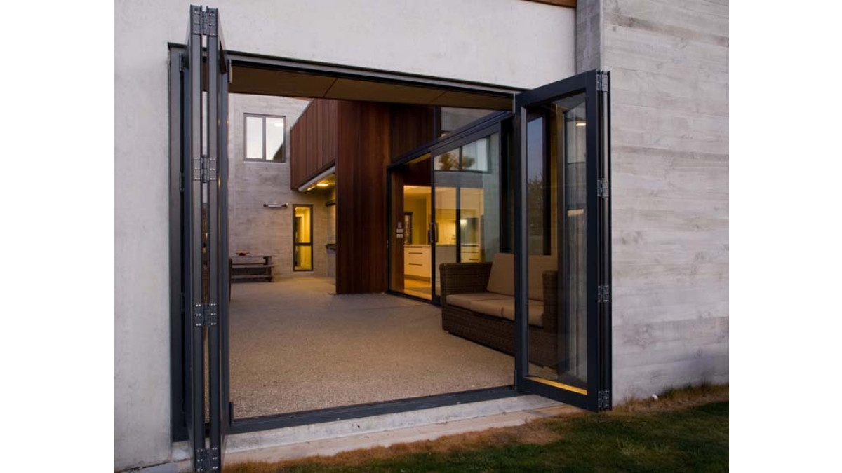 Windows and doors were powder coated in Matt Grey Friars.