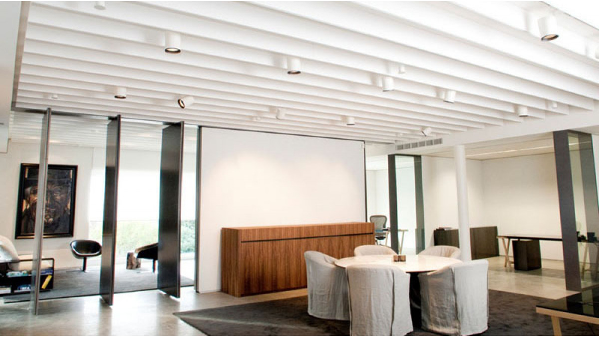 Vantage House<br />
<br />
Linear acoustic baffle beams, direct-fixed to the plasterboard ceiling using concealed fixings at the rear of the panels.