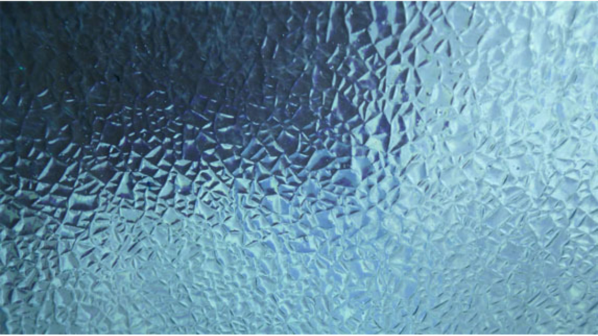 Topglass TX has an embossed textured coating that is practical and architecturally appealing.