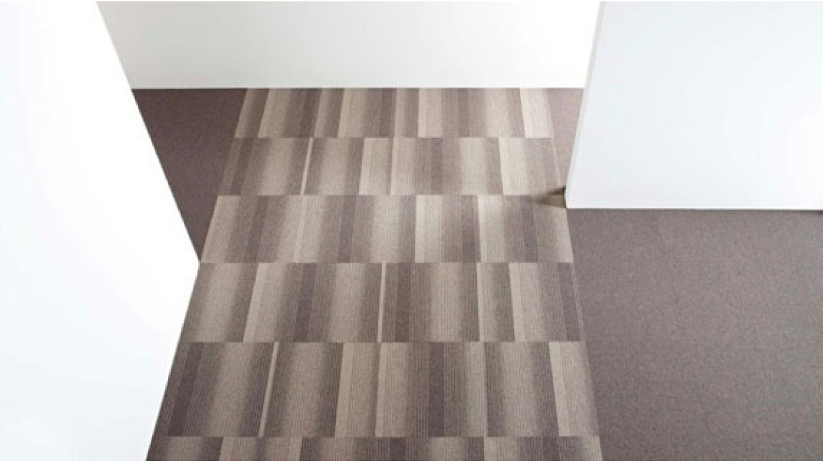 First Waves is a low loop-pile carpet tile with a variable linear pattern.