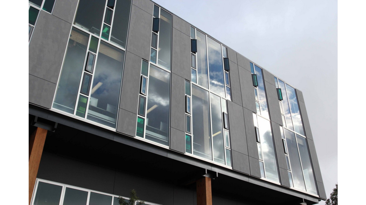 The solid wall panels and windows were part of an integrated curtainwall system supplied by window manufacturer Wight Aluminium.