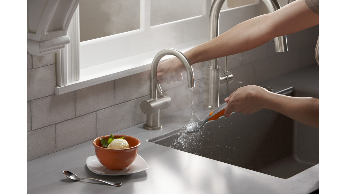 The InSinkErator Steaming Hot Water Tap supplies instant boiling water or filtered cold water at the touch of a lever.