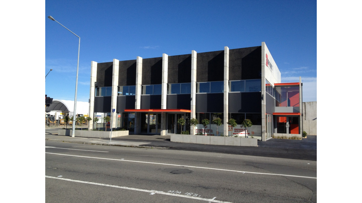 Kirk Roberts building: Exterior spandrel panels are finished in Resene X-200 tinted to Resene Double Foundry (Hot Charcoal).  Steelwork is finished in Resene Uracryl 403 tinted to Resene Daredevil and Resene Uracryl 404 tinted to Resene Double Foundry and concrete feature areas in Resene Lumbersider low sheen waterborne tinted to Resene Daredevil. To protect the fresh paintwork from the risks of graffiti, Resene Uracryl Graffitishield semi-gloss has been applied.<br />
 