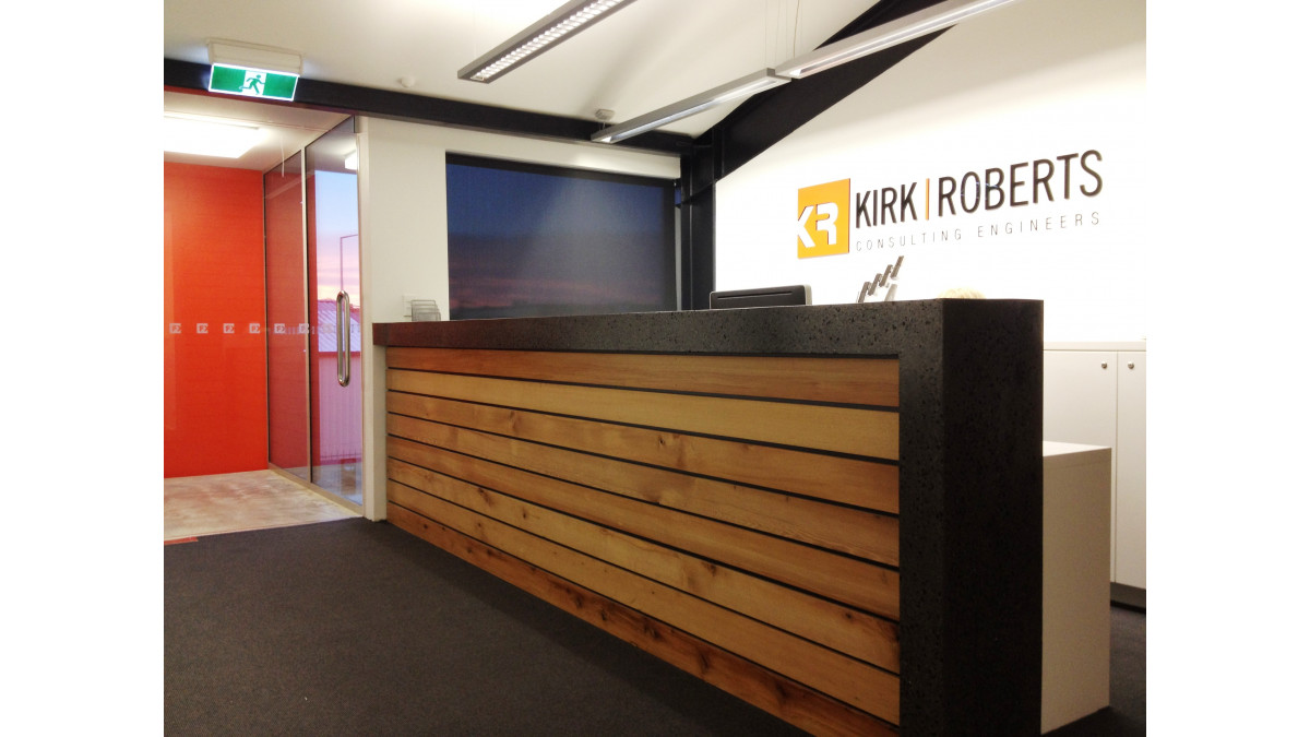Kirk Roberts building:  The interior colour palette is predominantly Resene Black White, accented with a striking feature wall of Resene Daredevil in the entry area and Resene Colorwood interior wood stain tinted to Resene Pitch Black topcoated in Resene Aquaclear waterborne urethane clear on plywood booth seats and white ceilings. <br />
 