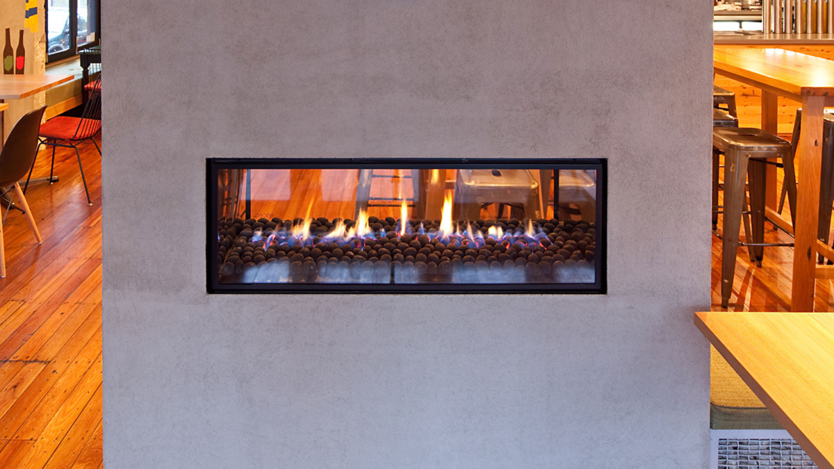Escea double-sided DX1000 fireplace welcomes patrons.