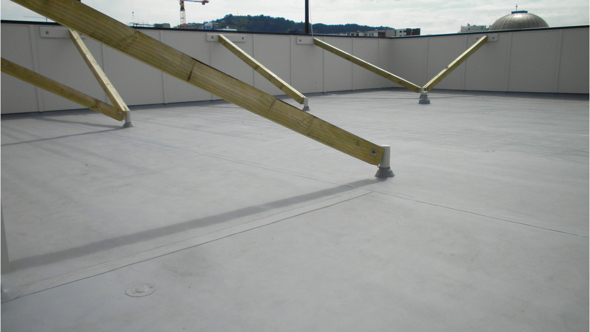Proprietary accessories result in a watertight finish surrounding roof penetrations.