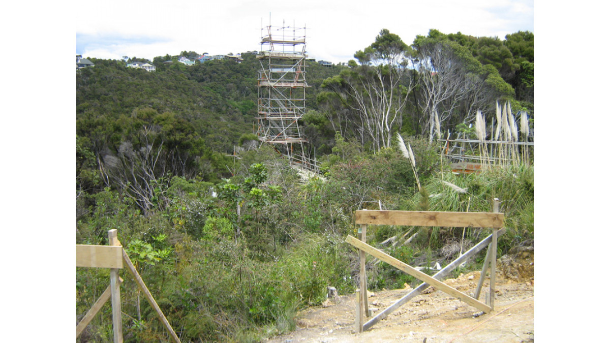 The scaffold tower with ‘centre point’ is shown behind the building site.