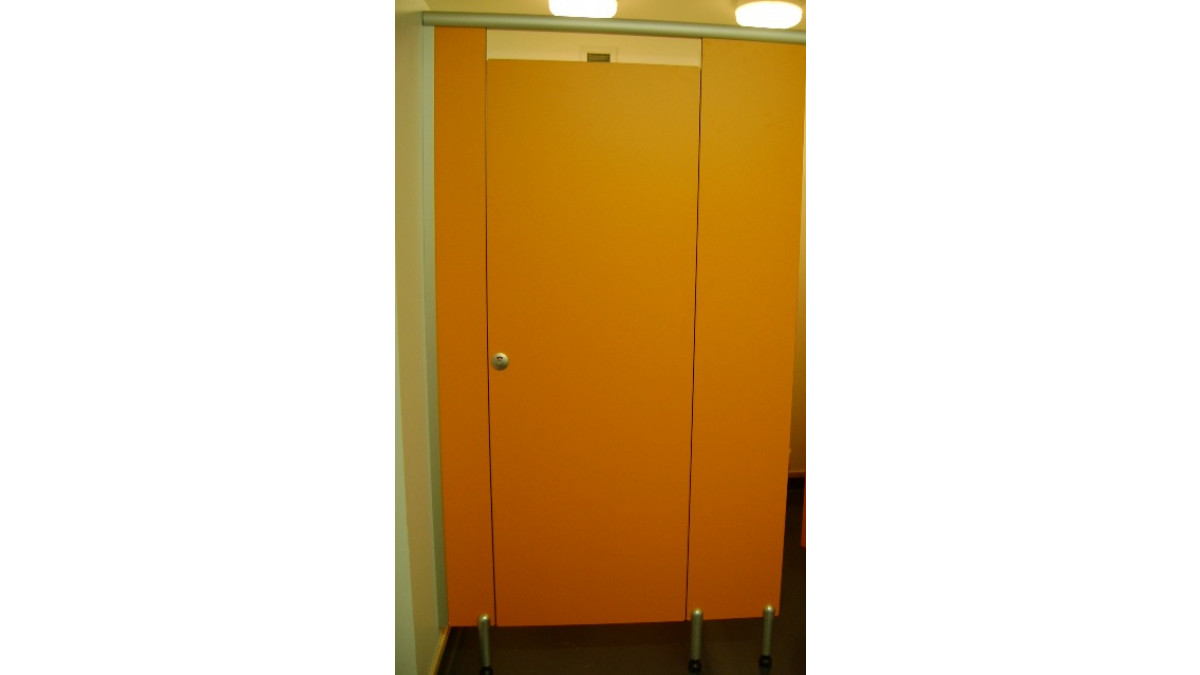 View of single toilet cubicle in Jaffa Orange.