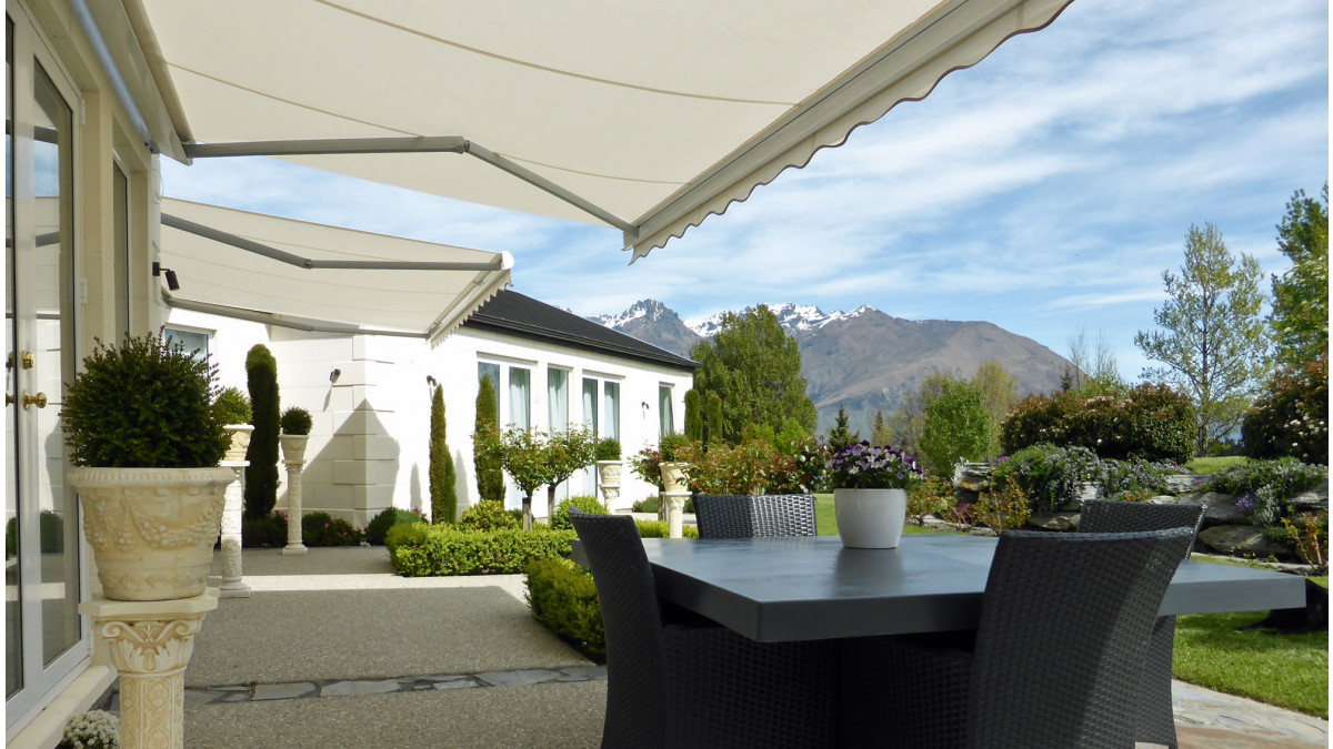 Felicia awnings shade the homeowners from the hot Queenstown sun.
