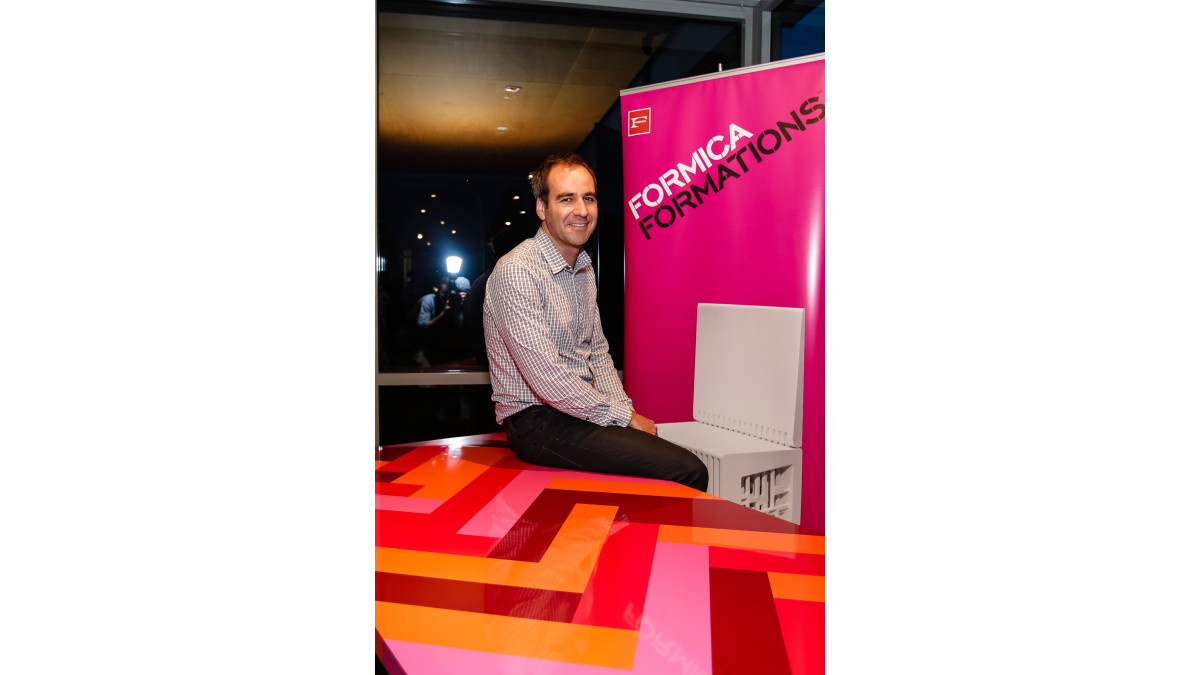 Hugh Worth with his red Herringbone table