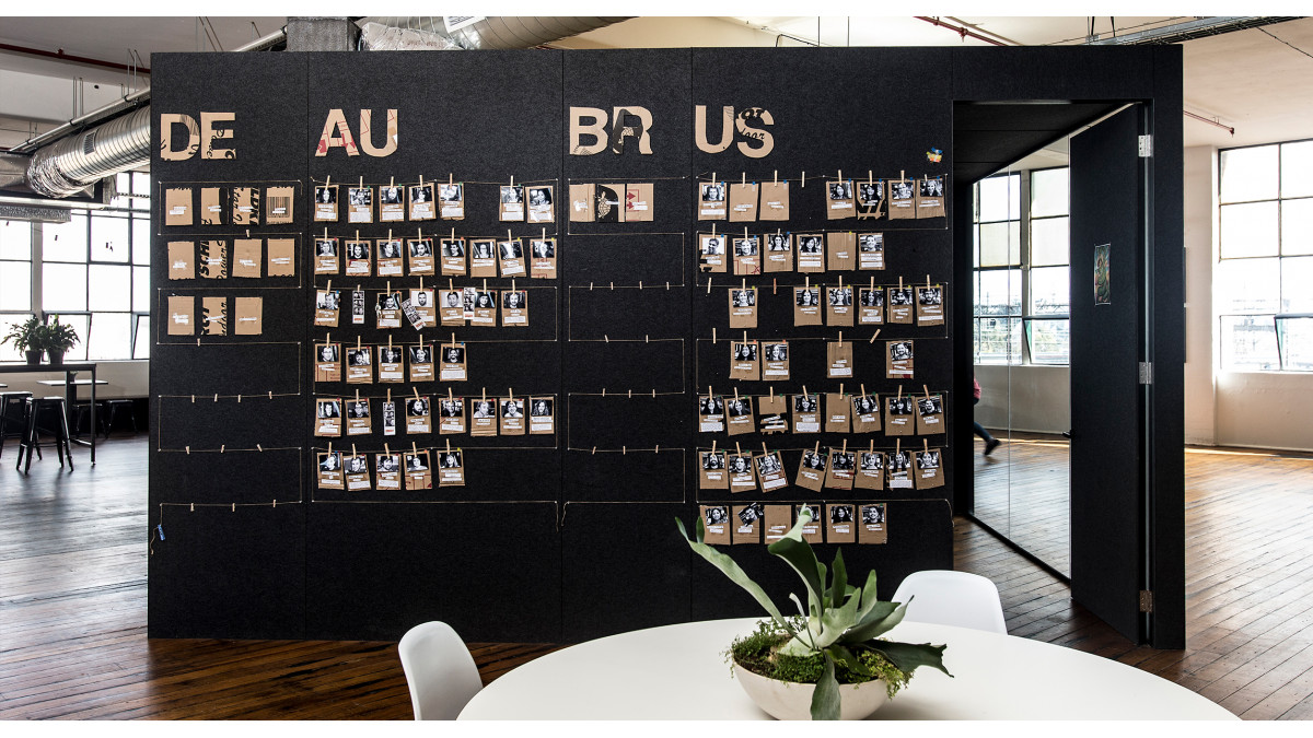 Cube transforms the out side of the Meeting Pods into functional acoustic notice boards.