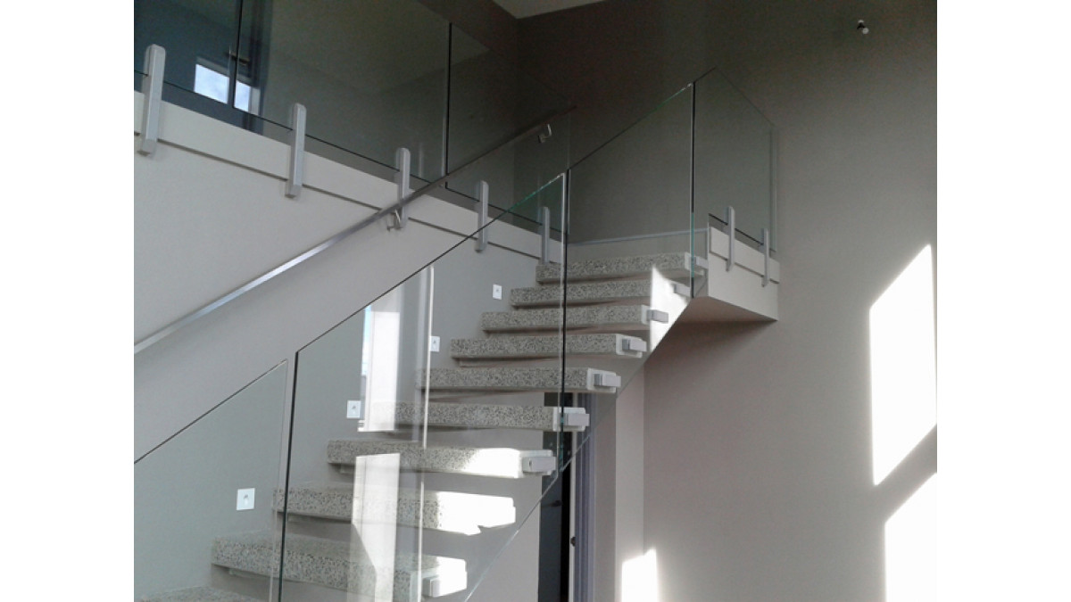 Frameless Balustrades were chosen for the stairs and landing.