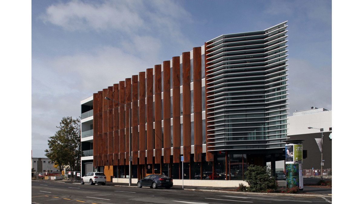 At the Norwest building a layer of horizontal louvres accentuates the sharp corner.