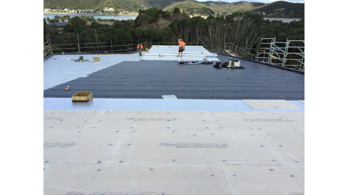 RL UltraTherm Xtreme system installation showing RL Base Deck, RL Vapour Barrier, RL PIR Board and RL Securock.