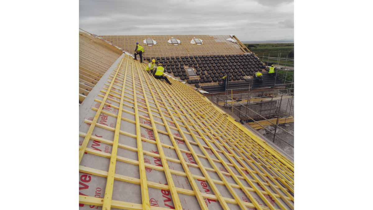 Dupont Tyvek Supro roof underlay under a clay tile roof. Photo courtesy of Dupont Tyvek.