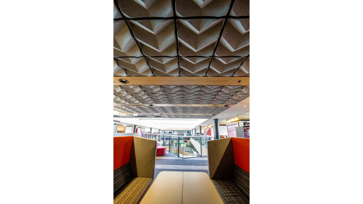 OROQI 3D Acoustic Ceiling Tile in Black CBI grid.